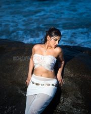 Alluring Yashika Aannand Cleavage in a White Pearl Bandeau Top Photos 06