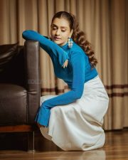 Angel Beauty Payal Rajput in a Royal Blue Long Sleeved Turtleneck Top and White Maxi Skirt Pictures 01