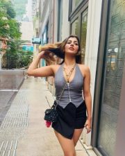 Appealing Yashika Aannand in a Grey Halter Neck Vest Top with a Black Asymmetrical Skort Pictures 02