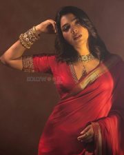 Attractive Aishwarya Lekshmi in a Red Kanchipuram Silk Saree with Matching Blouse Pictures 02