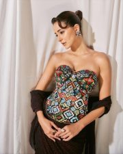 Attractive Ananya Panday in a Patola Corset Top and Bandhani Saree Skirt Pictures 03