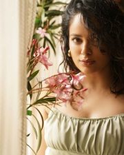 Attractive Nandita Swetha in a Green Satin Dress Photos 01