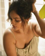 Attractive Nandita Swetha in a Spaghetti Strap Green Bodycon Dress Photos 03