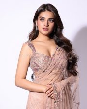 Attractive Nidhhi Agerwal in a Blush Pink Saree with a Matching Sleeveless Sequined Blouse Photos 11