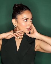 Attractive Rakul Preet Singh in a Black Sleeveless Blazer Dress with Deep V Neckline Pictures 02