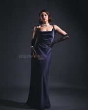 Attractive Regina Cassandra in a Stylish Black Long Dress with Lace Gloves Photos 04