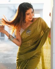 Beach Actress Sakshi Agarwal in a colorful floral crop top and blue shorts Photos 03 Beach Actress Sakshi Agarwal in a colorful floral crop top and blue shorts Photos 03
