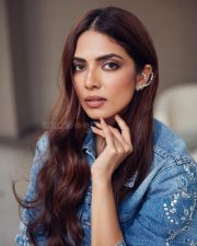 Beautiful Actress Malavika Mohanan in a Black Crop Top with a Matching Shorts and Denim Shirt Photos 01 Beautiful Actress Malavika Mohanan in a Black Crop Top with a Matching Shorts and Denim Shirt Photos 01