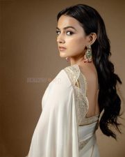 Beautiful Actress Shraddha Srinath in a Canoli Cream Silk Saree with a Sleeveless Blouse Pictures 01