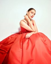 Beautiful Aditi Rao Hydari in a Scarlet Red Midi Dress with Pointed Corset and Roses On Bust Pictures 03