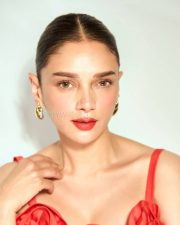 Beautiful Aditi Rao Hydari in a Scarlet Red Midi Dress with Pointed Corset and Roses On Bust Pictures 04