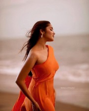 Beautiful Anikha Surendran at the Beach in an Orange Dress Pictures 03