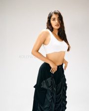Beautiful Bollywood Actress Pooja Hegde in a White Ribbed Crop Top and Wrinkled Black Cargo Pants Photos 01 Beautiful Bollywood Actress Pooja Hegde in a White Ribbed Crop Top and Wrinkled Black Cargo Pants Photos 01