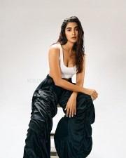 Beautiful Bollywood Actress Pooja Hegde in a White Ribbed Crop Top and Wrinkled Black Cargo Pants Photos 03 Beautiful Bollywood Actress Pooja Hegde in a White Ribbed Crop Top and Wrinkled Black Cargo Pants Photos 03