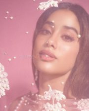 Beautiful Janhvi Kapoor in a Blush Pink Manish Malhotra Lehenga with a Sheer Blouse and Flowing Skirt Pictures 01