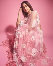 Beautiful Janhvi Kapoor in a Blush Pink Manish Malhotra Lehenga with a Sheer Blouse and Flowing Skirt Pictures 05