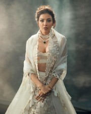 Beautiful Kajal Aggarwal in a White Embroidered Lehenga Photos 03