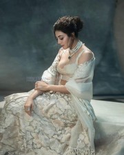 Beautiful Kajal Aggarwal in a White Embroidered Lehenga Photos 05