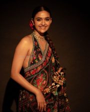 Beautiful Keerthy Suresh in a Multi Coloured Floral Saree with a Heart Shaped Backless Blouse Photos 04