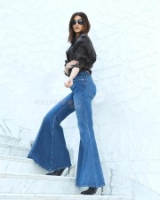 Beautiful Kriti Sanon in Leather Jacket With 70s Style Flared Denim Pants Pictures 02