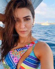 Beautiful Kriti Sanon in a Colourful Cut Out Swimsuit Photos 03