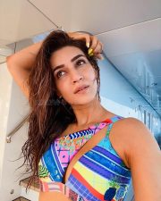 Beautiful Kriti Sanon in a Colourful Cut Out Swimsuit Photos 04