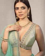Beautiful Malavika Mohanan Cleavage in a Green Lehenga Photos 03 Beautiful Malavika Mohanan Cleavage in a Green Lehenga Photos 03