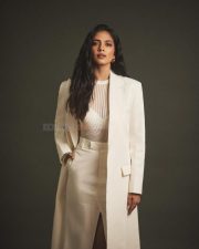 Beautiful Malavika Mohanan in an Off White Bralette with a See Through Top and Trench Coat with White Pants Photos 05 Beautiful Malavika Mohanan in an Off White Bralette with a See Through Top and Trench Coat with White Pants Photos 05