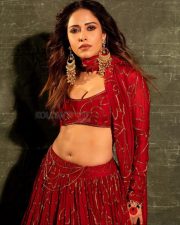 Beautiful Nushrratt Bharuccha in a Golden Embroidered Red Lehenga Pictures 04