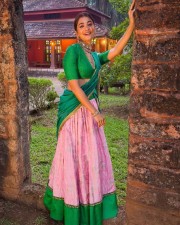 Beautiful Pooja Hegde in a Green and Pink Half Saree Pictures 01