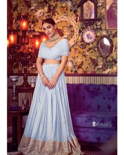 Beautiful Saniya Iyyappan in a Blue Lehenga Dress Photos 03