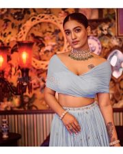 Beautiful Saniya Iyyappan in a Blue Lehenga Dress Photos 06