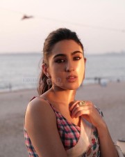 Beautiful Sara Ali Khan in a White Floral Saree with Pink and Blue Sleeveless Blouse Pictures 02
