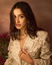 Beautiful Shraddha Kapoor in a Cream and Gold Designer Coat paired with Cream Pants Photos 05
