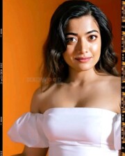 Beauty Queen Rashmika Mandanna in a White Off Shoulder Top and Denim Pant Photos 03