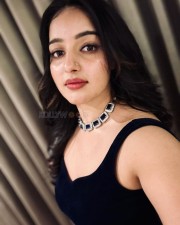Beauty in Black Malavika Menon in a Sleeveless Dress Pictures 01