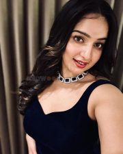 Beauty in Black Malavika Menon in a Sleeveless Dress Pictures 03