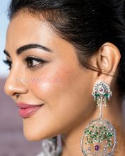 Bewitching Actress Kajal Aggarwal in a White Silver Ethnic Bridal Outfit Silver Diamond Chandelier Earrings Photos 03