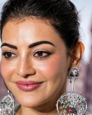 Bewitching Actress Kajal Aggarwal in a White Silver Ethnic Bridal Outfit Silver Diamond Chandelier Earrings Photos 04