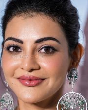 Bewitching Actress Kajal Aggarwal in a White Silver Ethnic Bridal Outfit Silver Diamond Chandelier Earrings Photos 05