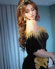 Black Rose Actress Urvashi Rautela in a Sculpted Black and Gold Corset Gown Pictures 02