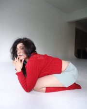 Bold Kannada Actress Pranitha Subhash in a Red Cable Knit Sweater with a Light Grey Knit Shorts and Knee High Red Socks Pictures 02