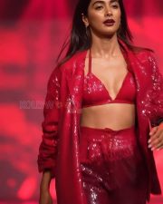 Bold Pooja Hegde in a Red Sequinned Bralette with an Oversized Blazer and Shimmery Pant at Mahindra Tech Fashion Tour Pictures 02