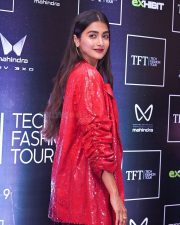 Bold Pooja Hegde in a Red Sequinned Bralette with an Oversized Blazer and Shimmery Pant at Mahindra Tech Fashion Tour Pictures 07