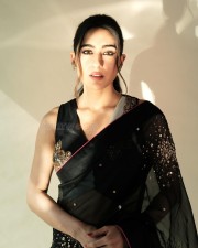 Bold Sara Ali Khan in a Black Embellished Sheer Saree with a Sleeveless Blouse Photos 02