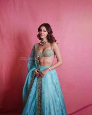 Bollywood Actress Ananya Panday in a Golden and Light Turquoise Lehenga with a Bralette Blouse Photos 01