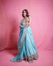 Bollywood Actress Ananya Panday in a Golden and Light Turquoise Lehenga with a Bralette Blouse Photos 03