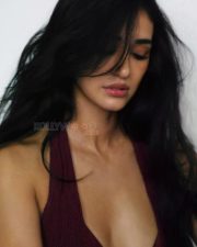 Bollywood Bombshell Disha Patani in a Brown Long Halter Neck Dress with a Deep V Shaped Neckline Photos 04