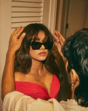 Bollywood Diva Janhvi Kapoor in a Pink Red Off Shoulder Mini Dress Photos 07