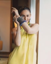 Bollywood Diva Rakul Preet Singh in a Yellow Backless Top and Wide Legged Pants Photos 04